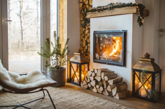 Fireplace burning warm, creating a cozy atmosphere in a room